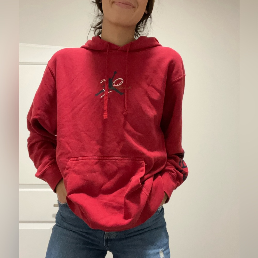 Red Nike Jordan sweatshirt. Size small in men’s.